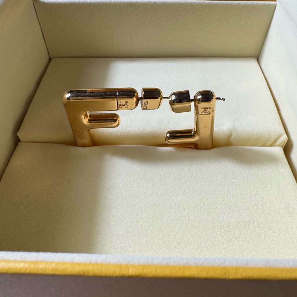 Fendi FF, gold color earrings. It can be used 2 ways! Box inc. Pre-loved.